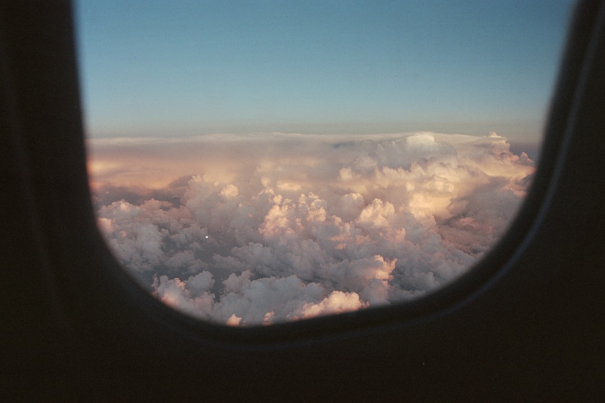 Plane window with last view of Spain
